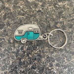 This beautiful key ring is NWOT. Great gift for a camper.